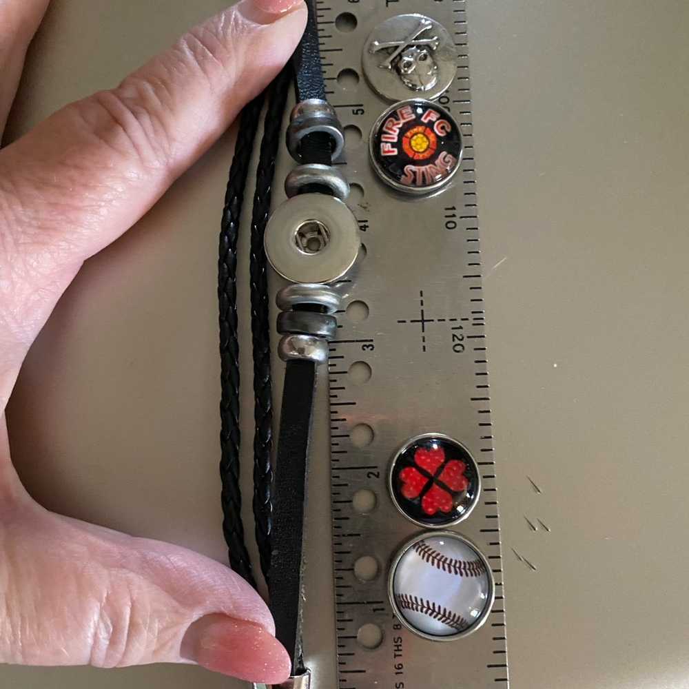 Black Leather Snap Style Bracelet with Silver Accents